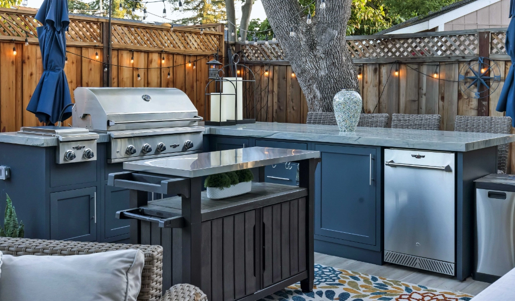 a relaxing and modern backyard living space and outdoor kitchen remodel with outdoor furniture